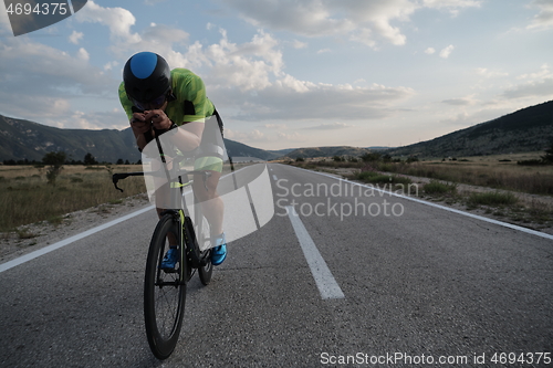 Image of triathlon athlete riding bike