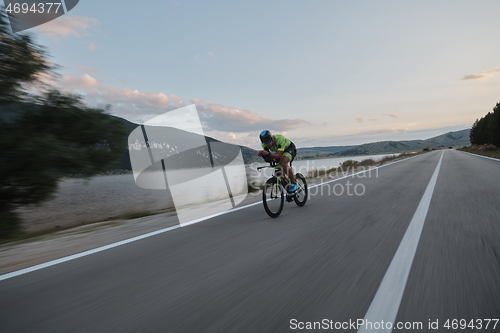 Image of triathlon athlete riding bike