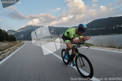 Image of triathlon athlete riding bike