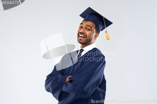 Image of happy indian graduate student in mortar board