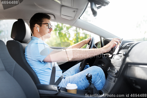 Image of man or driver driving car and using gps navigator