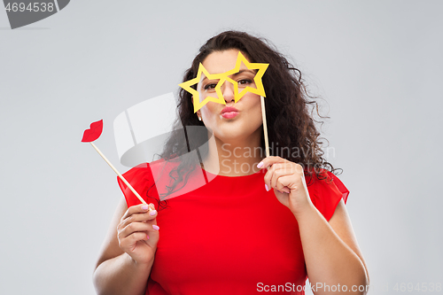 Image of funny woman with star shaped glasses and red lips