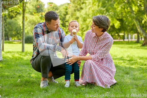 Image of happy family at summer park