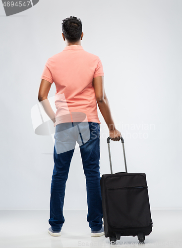 Image of indian man in polo shirt with travel bag