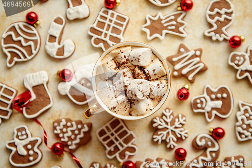 Image of Cup of hot chocolate and Christmas shaped gingerbread cookies