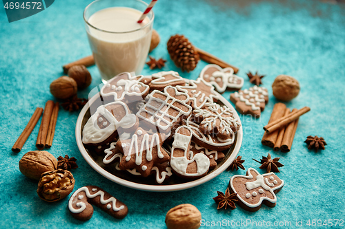 Image of Sweet Christmas composition. Assortment of gingerbread cookies on a plate