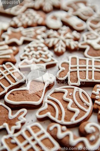 Image of Composition of delicious gingerbread cookies shaped in various Christmas symbols