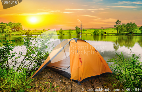 Image of Tent and river