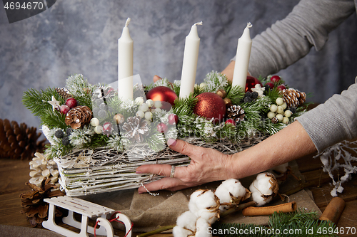 Image of Beautiful Christmas basket with candles