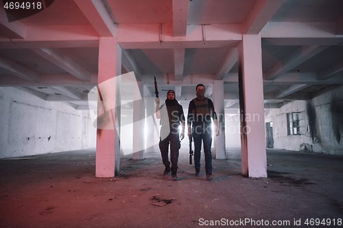 Image of soldier squad team portrait in urban environment