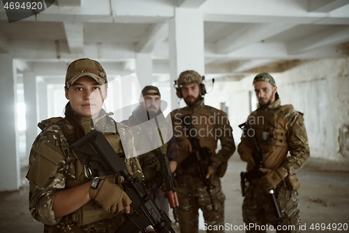 Image of soldier squad team portrait in urban environment