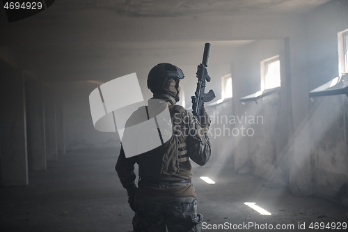 Image of modern warfare soldier in urban environment