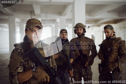 Image of soldier squad team portrait in urban environment