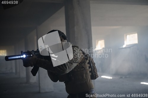 Image of modern warfare soldier in urban environment battlefield