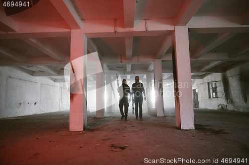 Image of soldier squad team portrait in urban environment