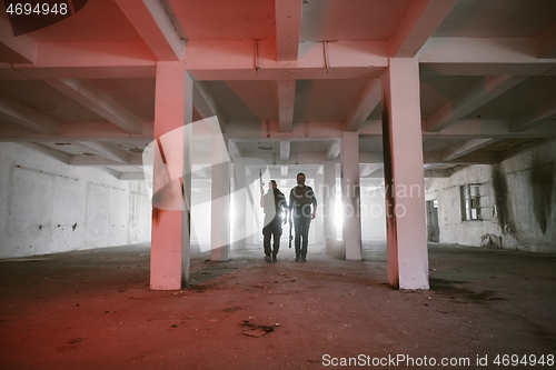 Image of soldier squad team portrait in urban environment