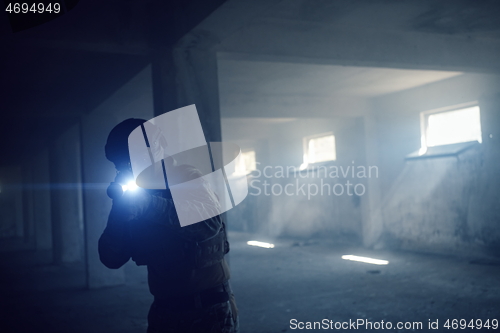 Image of modern warfare soldier in urban environment battlefield