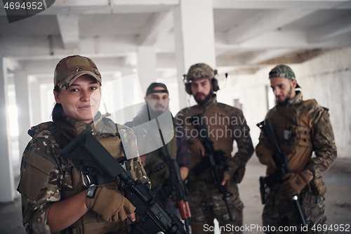 Image of soldier squad team portrait in urban environment