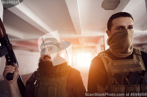 Image of soldier squad team portrait in urban environment