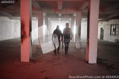 Image of soldier squad team portrait in urban environment