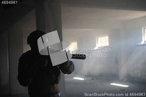 Image of modern warfare soldier in urban environment battlefield