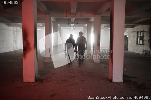 Image of soldier squad team portrait in urban environment