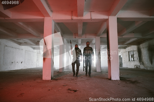 Image of soldier squad team portrait in urban environment