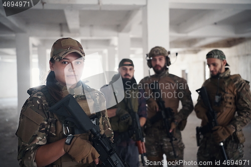 Image of soldier squad team portrait in urban environment