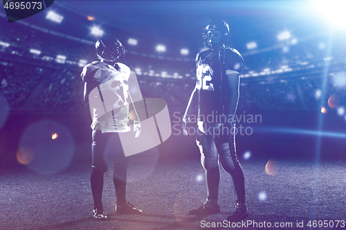 Image of portrait of confident American football players