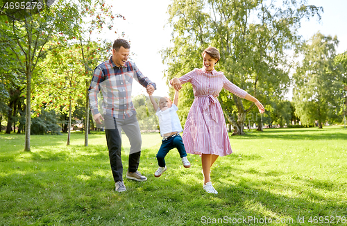 Image of happy family having fun at summer park