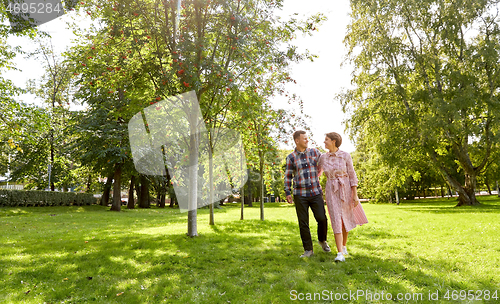 Image of happy couple in summer park