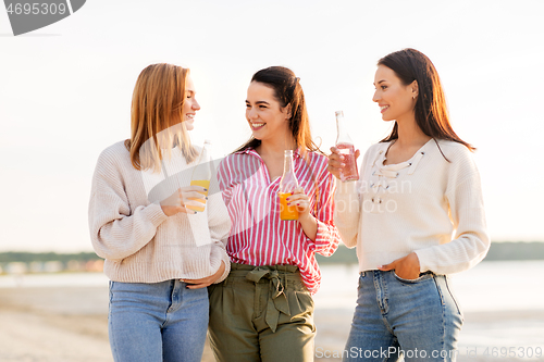 Image of young women with non alcoholic drinks talking