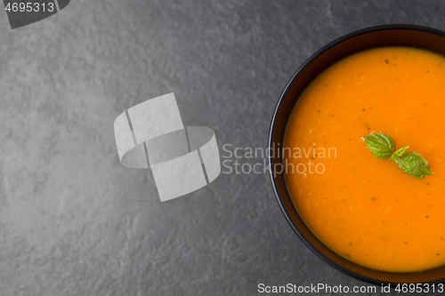 Image of close up of vegetable pumpkin cream soup in bowl