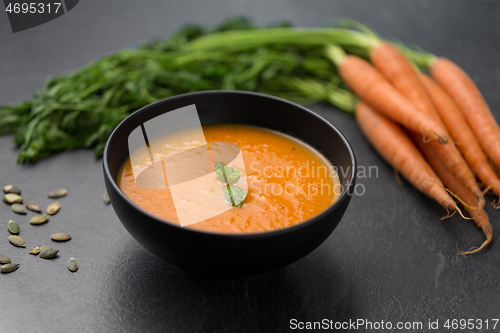 Image of close up of pumpkin cream soup and vegetables