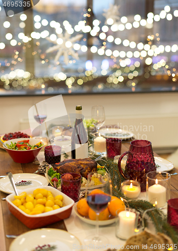 Image of food and drinks on christmas table at home