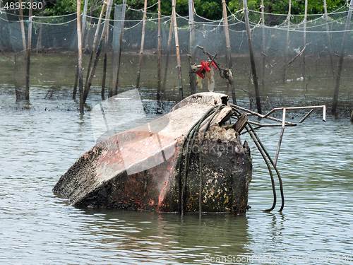Image of Wreck of plastic speedboat