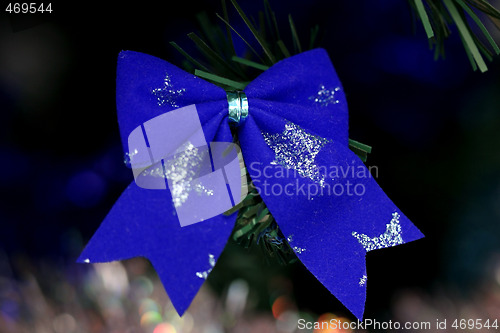 Image of Christmas ornaments on tree.