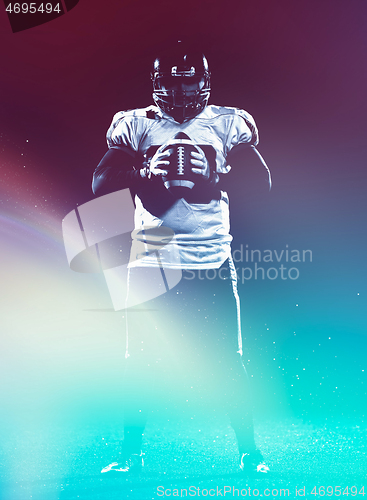 Image of portrait of confident American football player