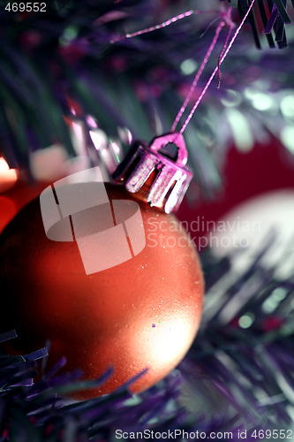 Image of Christmas ornaments on tree.