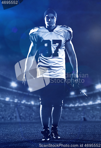 Image of portrait of young confident American football player