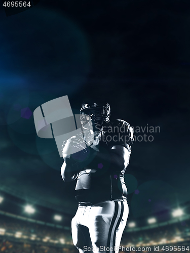 Image of portrait of confident American football player