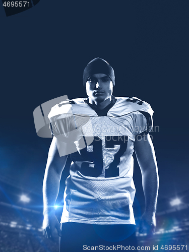 Image of portrait of young confident American football player