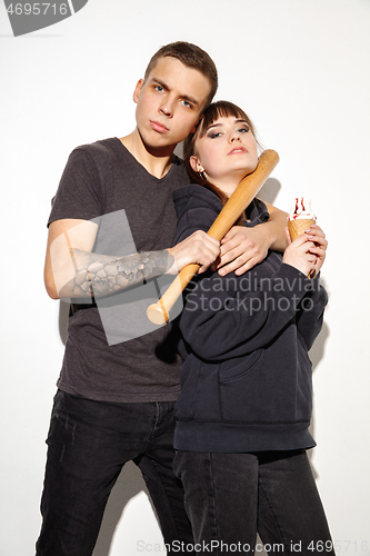 Image of Close up fashion portrait of two young pretty hipster teens