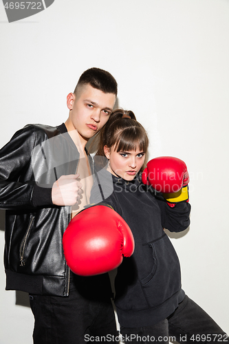 Image of Close up fashion portrait of two young pretty hipster teens