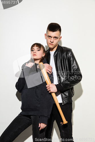 Image of Close up fashion portrait of two young pretty hipster teens