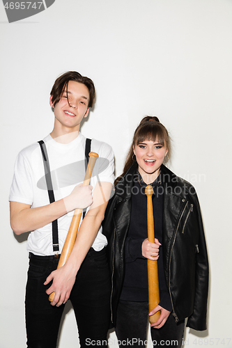 Image of Close up fashion portrait of two young pretty hipster teens