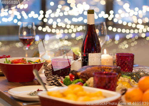 Image of food and drinks on christmas table at home