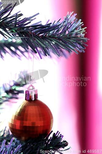 Image of Christmas ornaments on tree.