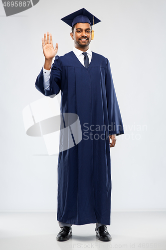 Image of indian graduate student waving hand