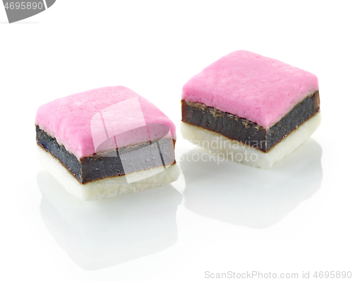 Image of two pink candies with licorice